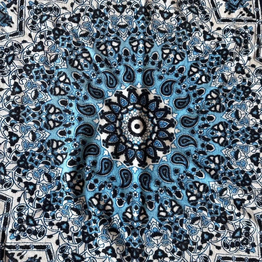Round Blue Mandala Beach Towel in blue and black print